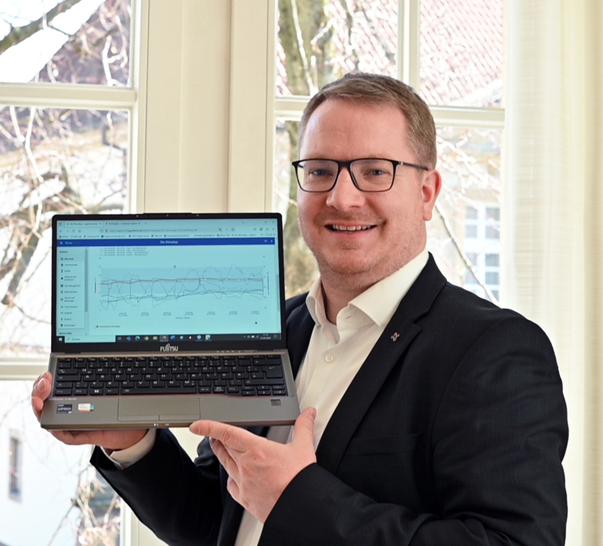 Michael Peine präsentiert die KlimaApp.